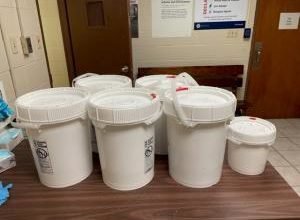 Buckets containing nearly 175 pounds of liquid methamphetamine seized by CBP officers at Progreso International Bridge.