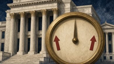 Illustration of a central bank building behind a gauge held steady at the middle with red arrows pointing up